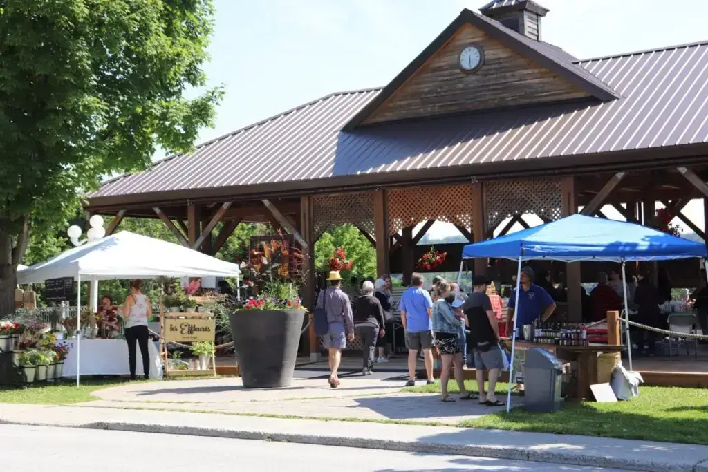 a group of people outside a market